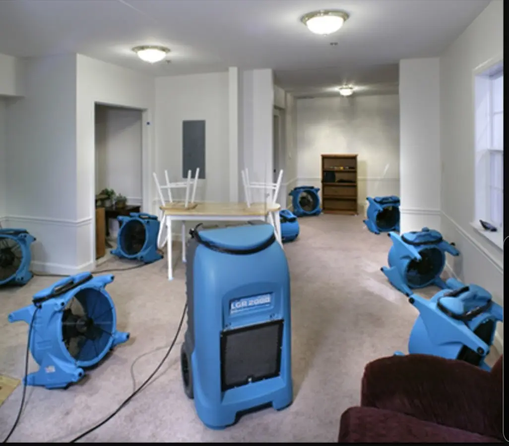 Air movers and dehumidifier setup for Water Damage Restoration in Muskegon Heights